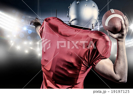 Composite image of rear view of american football player throwin 19197125
