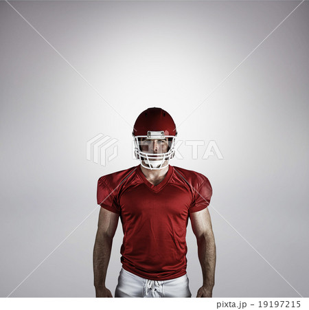 Composite image of american football player looking at camera Composite image of american football player looking at camera 19197215