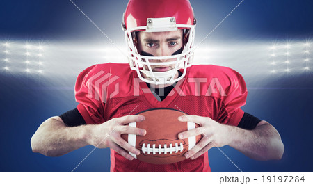 Composite image of portrait of focused american football player Composite image of portrait of focused american football player 19197284