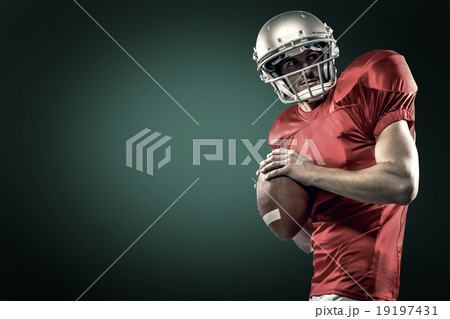 Composite image of american football player in red jersey throwing the ball Composite image of american football player in red jersey throwing the ball 19197431