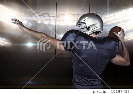 Composite image of rear view of american football player throwin 19197432
