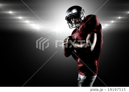 Composite image of serious american football player in red jerse 19197515