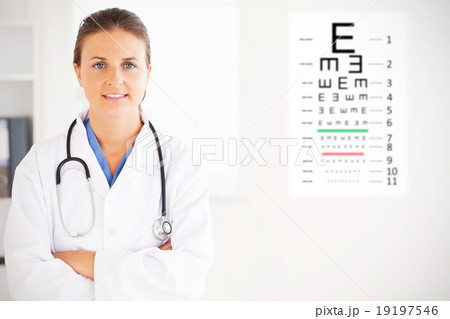 Composite image of charming doctor having a stethoscope around h 19197546