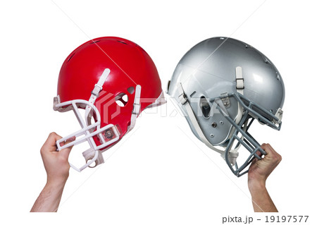 Composite image of american football player handing his helmet Composite image of american football player handing his helmet 19197577