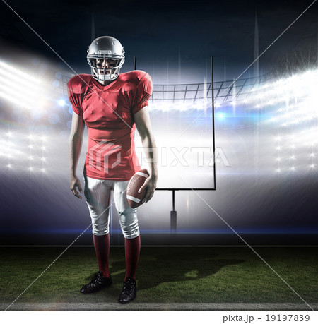 Composite image of portrait of sportsman with american football Composite image of portrait of sportsman with american football 19197839