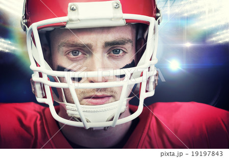 Composite image of portrait of focused american football player 19197843
