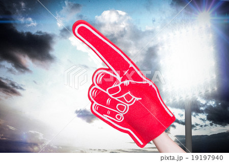 Composite image of american football player holding supporter fo 19197940