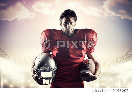 Composite image of confident american football player in red jer Composite image of confident american football player in red jer 19198002