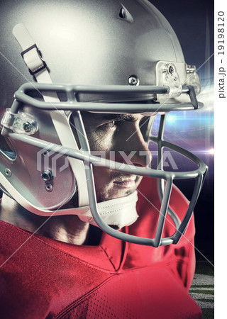 Composite image of serious american football player in red jerse Composite image of serious american football player in red jerse 19198120
