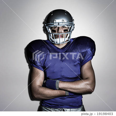 Composite image of portrait of determined american football play Composite image of portrait of determined american football play 19198403