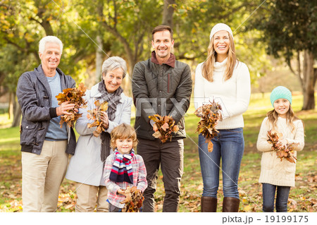 Extended family are ready to throw leaves around Extended family are ready to throw leaves around 19199175