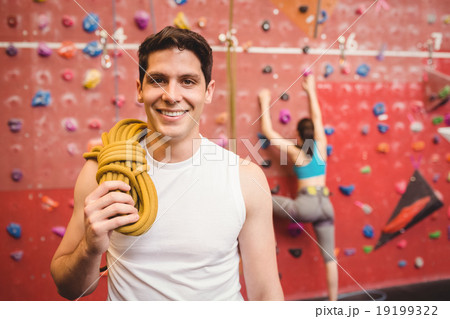 Fit man at the rock climbing wall Fit man at the rock climbing wall 19199322