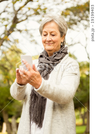 Senior woman in the park 19199403