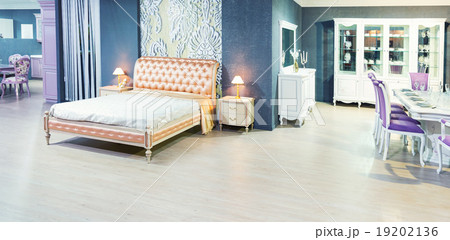 Nice bed in typical contemporary setting 19202136