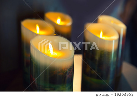 Burning candles on dark background 19203955