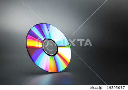 Compact disk on grey 19205037