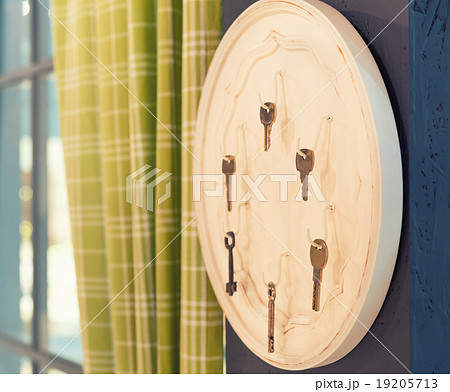 Many metal hanger over wood 19205713