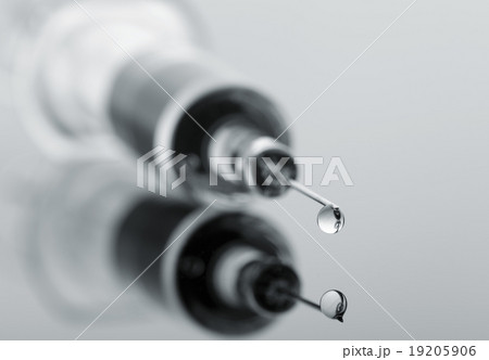 Medical syringe with injection solution drop 19205906