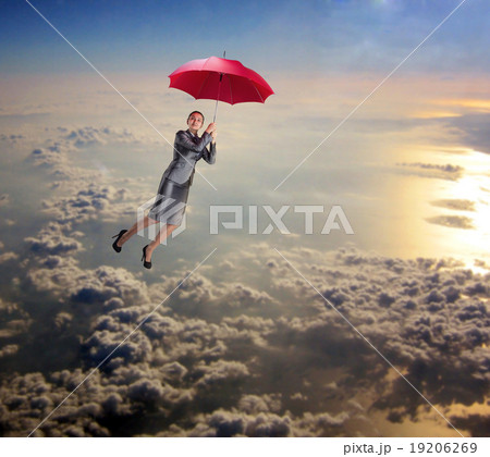 Woman flying in the sky with umbrella 19206269