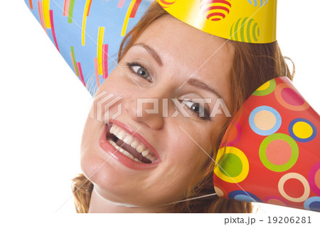 Happy woman in three party hats 19206281