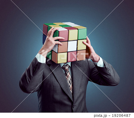 Businessman with rubik cube head Businessman with rubik cube head 19206487