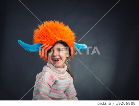 Little girl in party hat Little girl in party hat 19206989