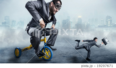 Nerdy businessman riding a small bicycle 19207671