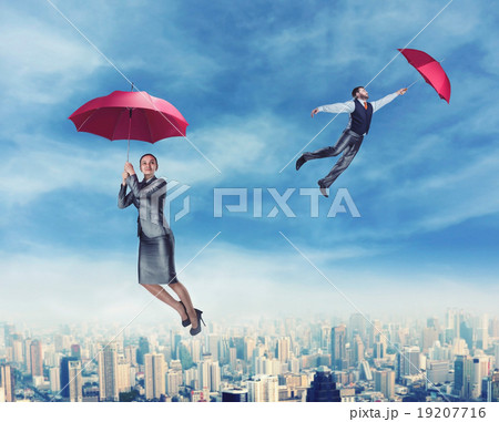 People flying in the sky with umbrellas People flying in the sky with umbrellas 19207716