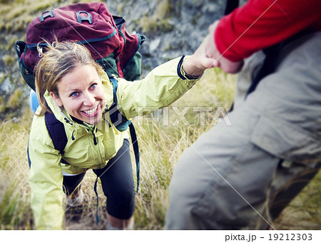 Couple Hiking Helping Climbing Mountain Concept Couple Hiking Helping Climbing Mountain Concept 19212303