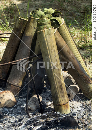 Glutinous rice roasted in bamboo joints Glutinous rice roasted in bamboo joints 19219709