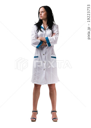 Nurse or young doctor standing isolated on white 19223753