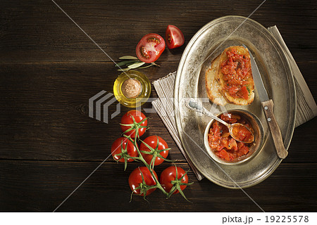 Appetizer with tomato sauce and bruscetta. Appetizer with tomato sauce and bruscetta. 19225578