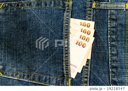 Thai bank note in jeans pocket Thai bank note in jeans pocket 19228547