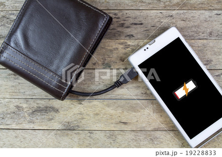 wallet with energy charge, charging smartphone 19228833