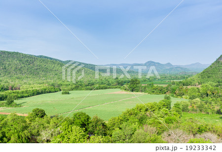 Forest and farm land mountain in blue sky. Forest and farm land mountain in blue sky. 19233342