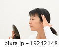 加齢を気にする女性 19242148