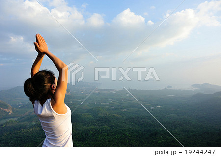 young yoga woman mountain peak young yoga woman mountain peak 19244247
