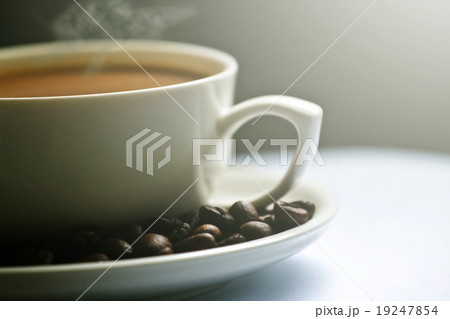 Coffee cup and coffee beans Coffee cup and coffee beans 19247854