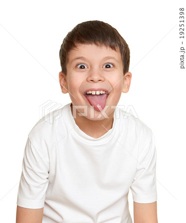 grimacing face boy portrait, teenager closeup 19251398