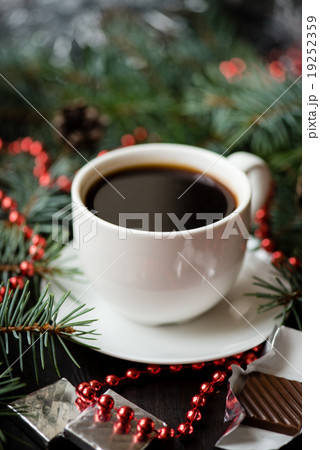 Christmas still life cup of coffee and chocolate 19252359