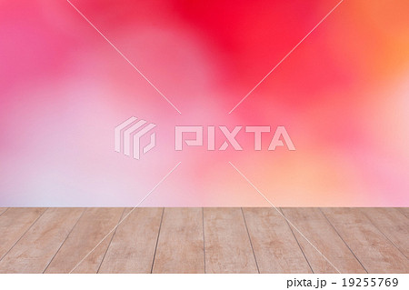 Wood table top on color abstract blurred 19255769