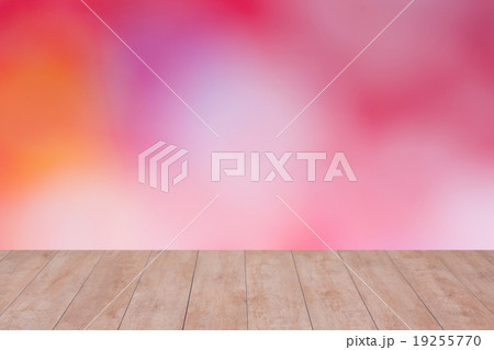 Wood table top on color abstract blurred Wood table top on color abstract blurred 19255770