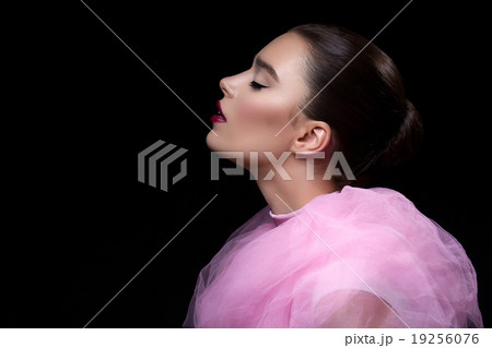 Beautiful girl in pink lace collar 19256076