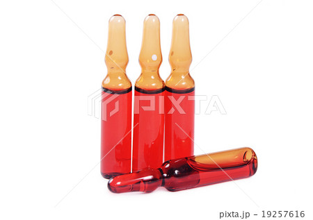 Ampoule with medicine isolated on a white  19257616