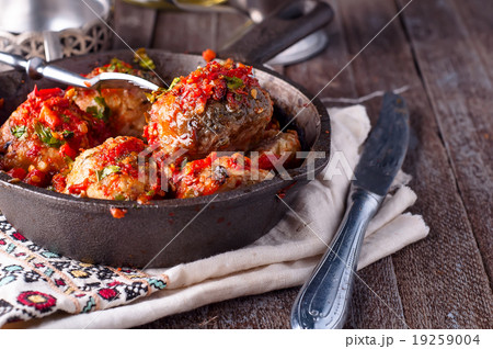 meatballs with tomato sauce in black pan meatballs with tomato sauce in black pan 19259004