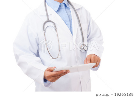 Doctor pointing on a digital tablet 19265139