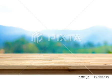 Wood table top on blur mountain background 19266249