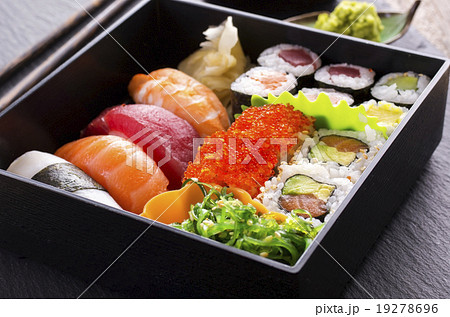 bento box with sushi and rolls 19278696