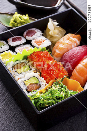 bento box with sushi and rolls 19278697