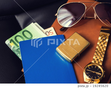 Traveler's accessory, passport, money, golden Traveler's accessory, passport, money, golden 19285620